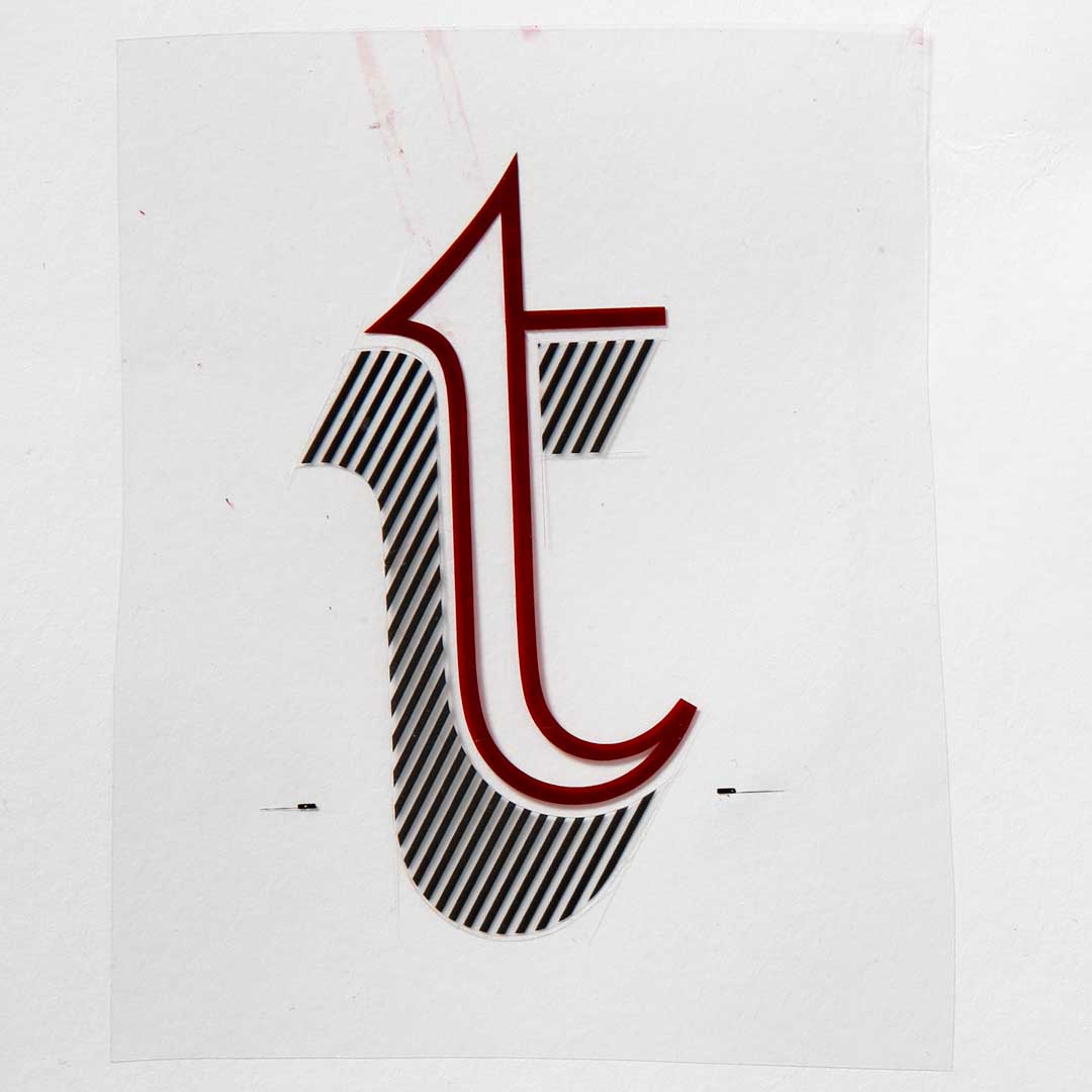 Freda’s rubylith cut of Letraset Talisman lowercase ‘t’.